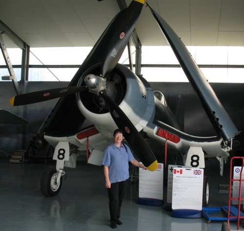 Dale standing in front of the Corsair.