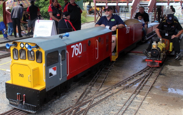 DG760 at the station loading passengers.